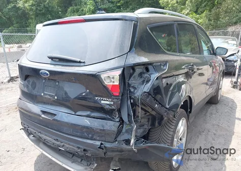 2018 Ford Escape Titanium z USA, uszkodzony, nr VIN 1FMCU9J97JUA68286